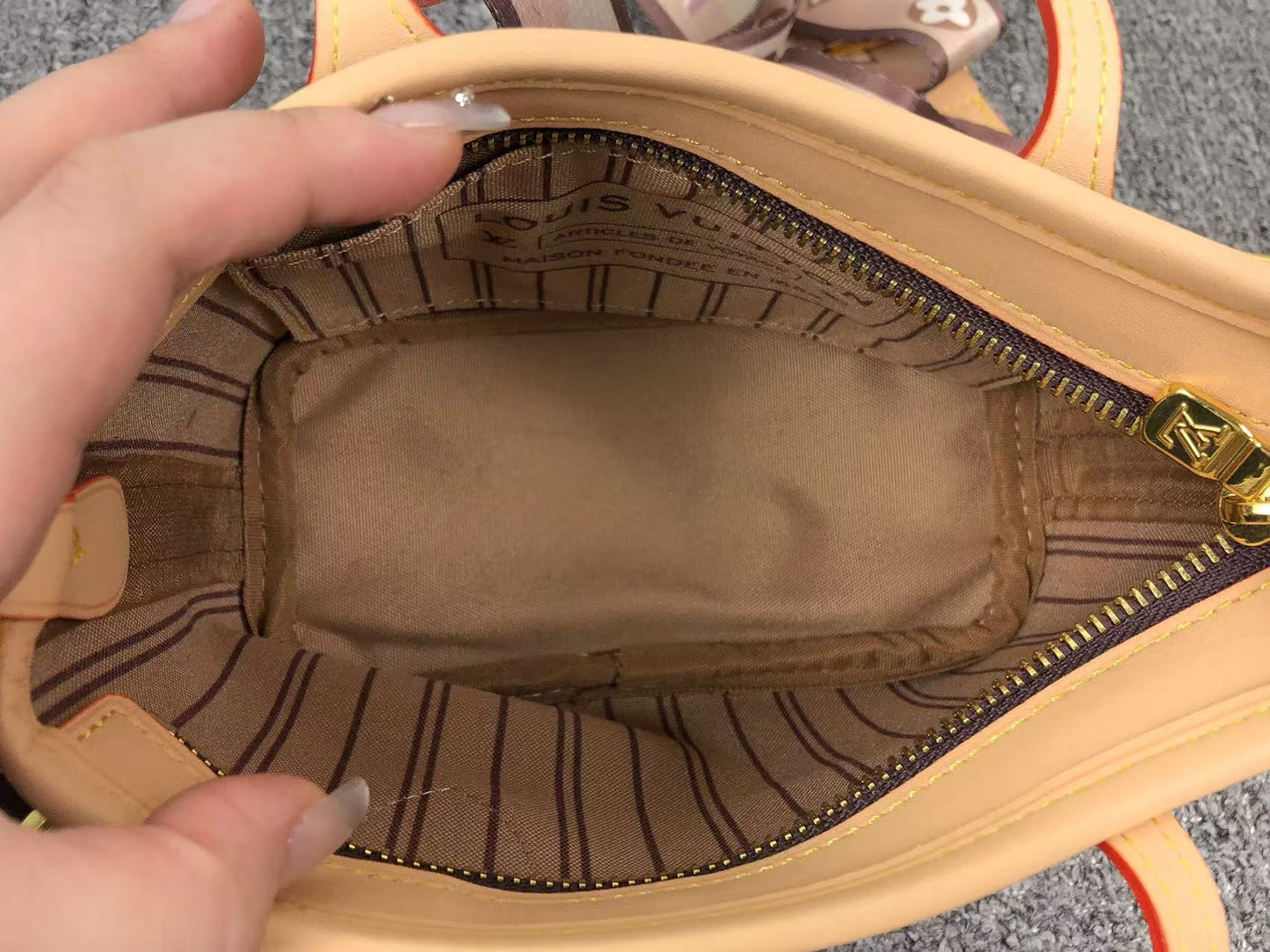 LV. SAC FEMME