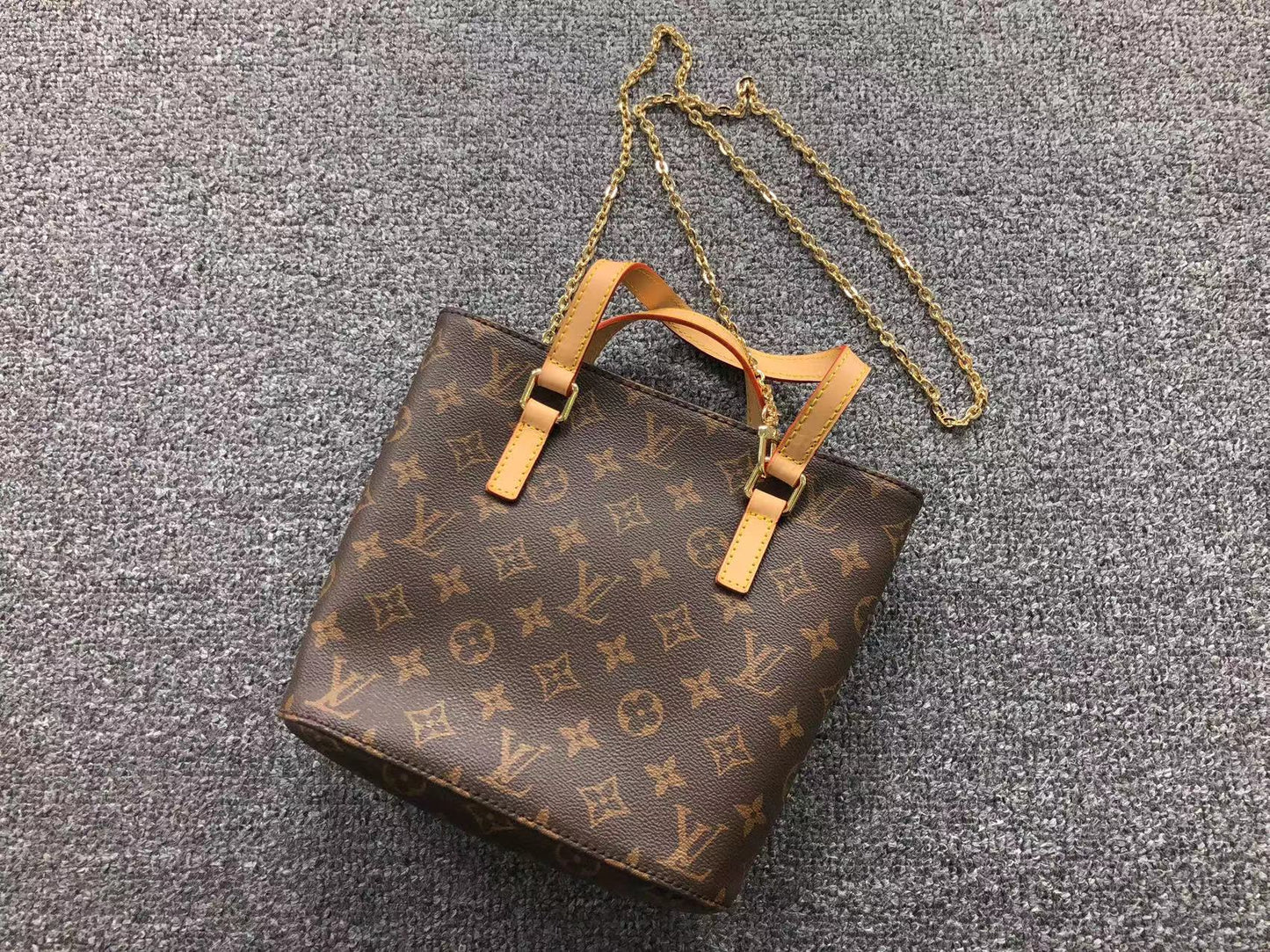 LV. SAC FEMME